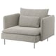 SÖDERHAMN armchair in gray fabric, modern design with deep seating and high metal legs.