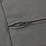 Close-up of a high-quality zipper on a finely woven, textured gray fabric, showcasing durability and precision.