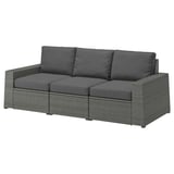 Modern gray wicker outdoor sofa with plush cushions, modular design.
