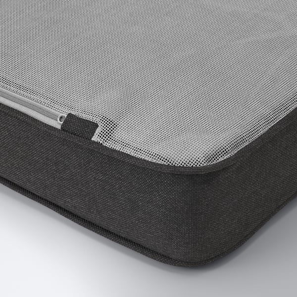 Black and white mesh zippered storage bag, corner detail close-up.