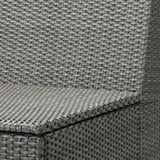 High-quality, tightly woven gray outdoor wicker chair, showcasing intricate weaving pattern and sturdy design.