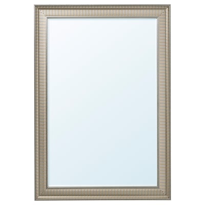 A vertical mirror named SONGE with a silver frame, featuring an ornate, textured design.