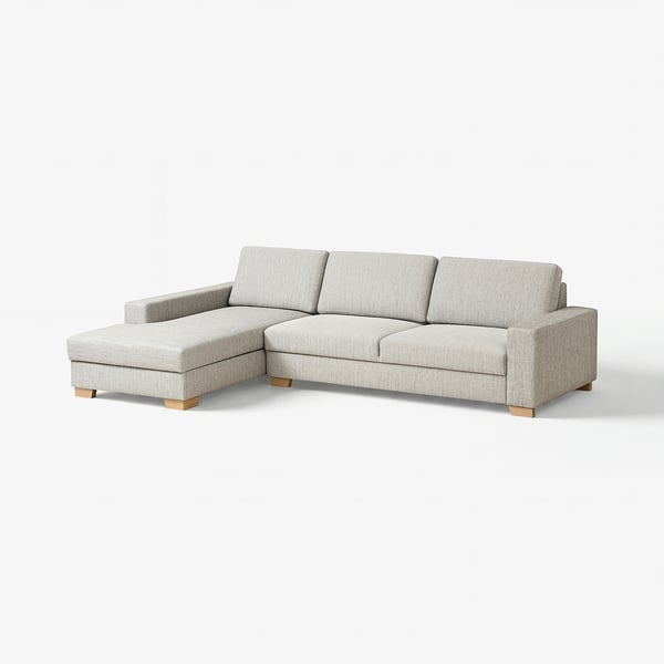 A light grey SÖRVALLEN sectional sofa with a minimalist design, featuring a comfortable chaise longue and wooden legs.