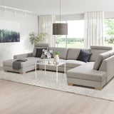 Modern gray SÖRVALLEN sectional sofa with chaise, stylish decor in bright living room.