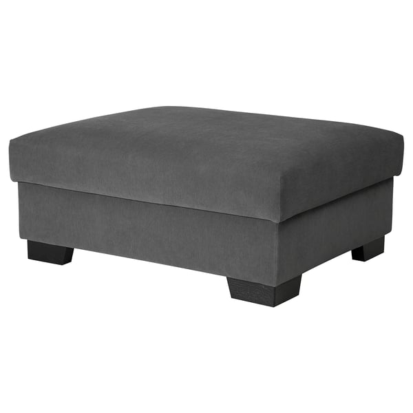 The SÖRVALLEN footstool is grey, rectangular with angled front. It is upholstered in grey textured fabric. Four wooden legs support it.