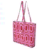 Bright pink and red patterned tote bag with white design, long handles, rectangular shape. Made from 100% recycled polyester.