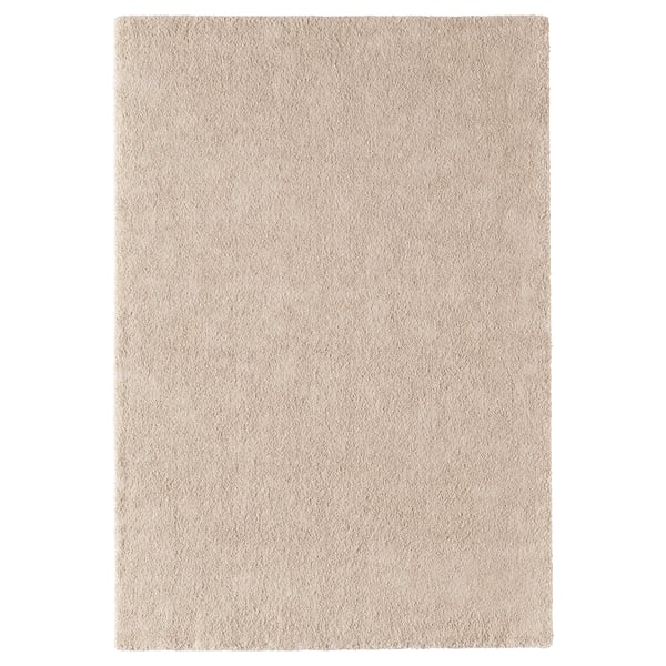 A beige STOENSE rug, rectangular, soft, thick-pile floor mat made from polypropylene, ideal for comfort.