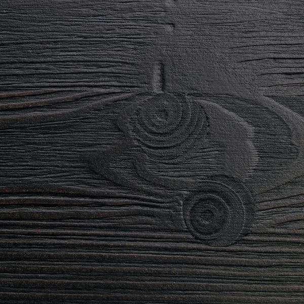 Dark wooden panel with visible grain and swirling knot patterns, reflecting high-quality wood texture.