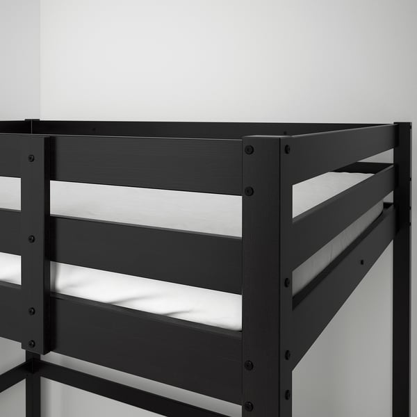 This image shows a dark-colored loft bed with a sturdy ladder, ideal for maximizing small spaces with its compact and versatile design.