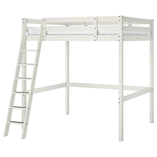 A white wooden STORÅ loft bed with a ladder on one side.