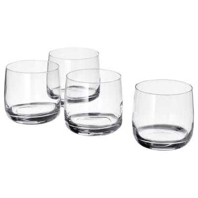 Four clear, cylindrical STORSINT glasses arranged in a diamond shape, showcasing their smooth, seamless design and crystalline shine.