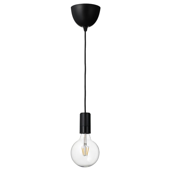 A SUNNEBY pendant lamp with a black cord and a glowing led bulb in a clear glass shade.