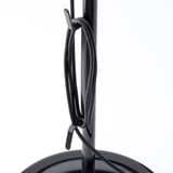 Image shows a black SVARTNORA lamp with adjustable cable and height, part of a series inspired by danish street lighting.