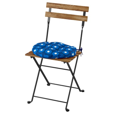 Blue cushioned wooden chair; rectangular seat & back, black metal legs.