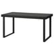 Option: A TARSELE extendable dining table. Its black with a veneer top and metal legs, featuring a 1950s industrial design.