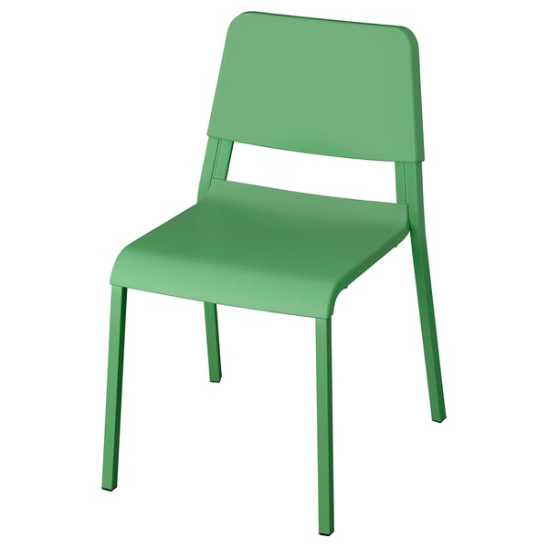 Green plastic chair, named TEODORES, sturdy and stackable, suitable for various settings.