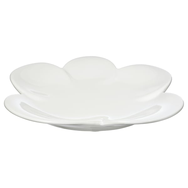 White petal-shaped plate, sleek glaze, stoneware material, intricate design, stylish tableware.
