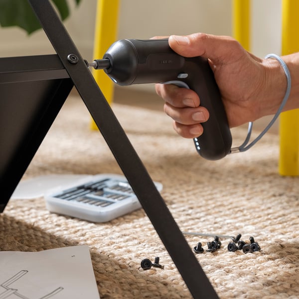 Using TRIXIG cordless screwdriver for furniture assembly. Led light helps in dark spaces; magnet secures bits.