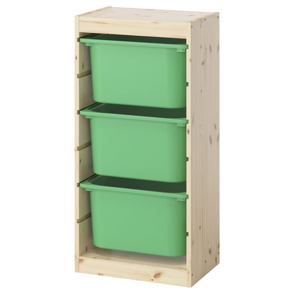 Ikea TROFAST storage unit with 3 green plastic bins in wooden frame, designed for childrens toys, simple and organized.