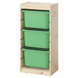 Ikea TROFAST storage unit with 3 green plastic bins in wooden frame, designed for childrens toys, simple and organized.