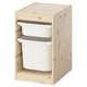 TROFAST light wood storage unit with white bins for kids toys.