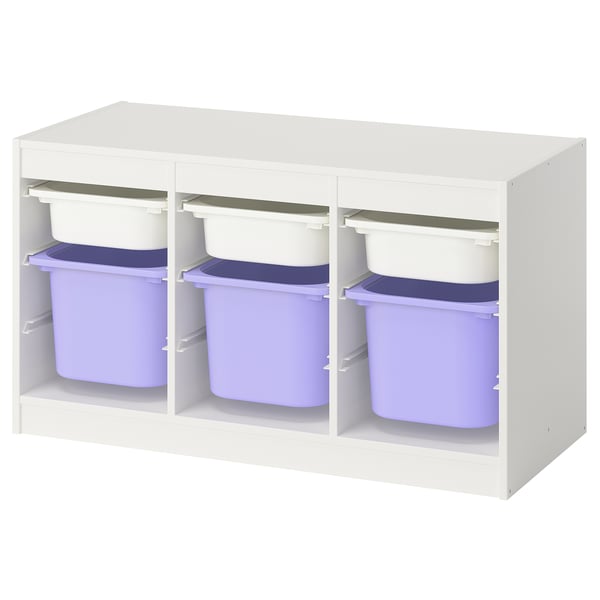 A white TROFAST storage unit with purple and blue plastic bins, ideal for organizing childrens toys.