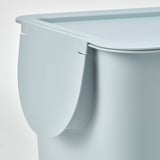 Close-up of TRÖSKNING bin, clean, modern design, smooth surface, with lid.