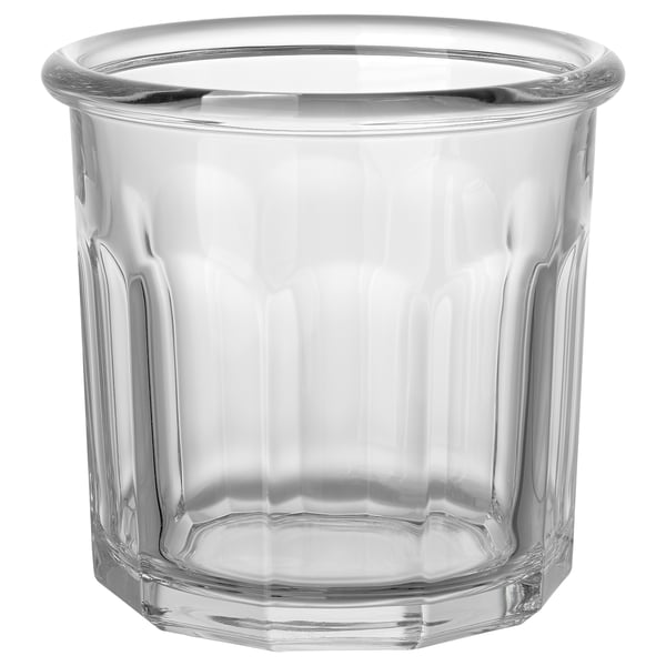 TRUMFISK clear glass jar, cylindrical shape with ribbed design, ideal for food storage.