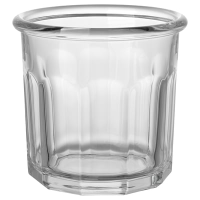TRUMFISK clear glass jar, cylindrical shape with ribbed design, ideal for food storage.
