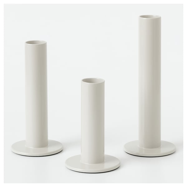 Three white TUVKORNELL candle holders, cylindrical, varying heights, in eva foam, by hagberg siblings.