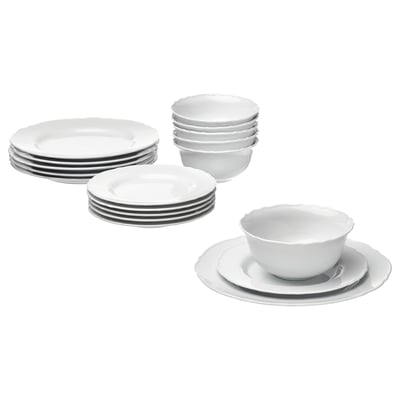A set of white UPPLAGA porcelain dinnerware, including plates and bowls, with a rustic design and ruffled edges.