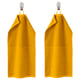 Two bright yellow VÅGSJÖN towels hang side by side on hooks, rectangular with folded edges.