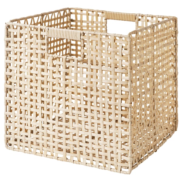 Woven light brown storage basket with sturdy handles.