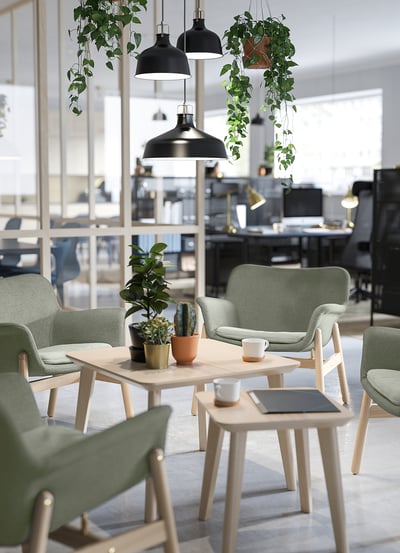 VEDBO armchair, light green, curved back & seat, wooden legs, soft padding.