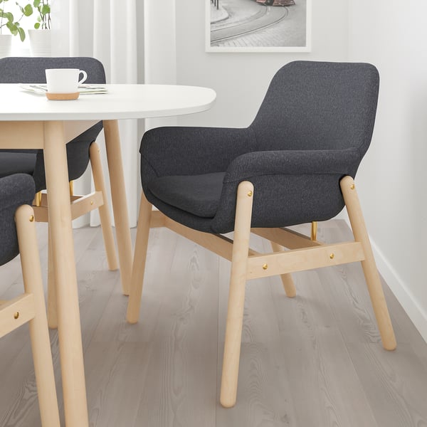 Modern dining set with dark gray VEDBO chair & white table. Light wooden legs, minimalist design.