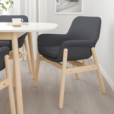 Modern dining set with dark gray VEDBO chair & white table. Light wooden legs, minimalist design.