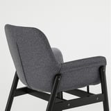 Modern upholstered chair with black frame, grey fabric, and armrests. Ideal for dining, comfortable and stylish.