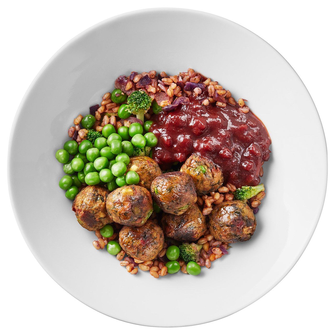 Veggie balls, grain pilaf, green peas BBQ sauce IKEA