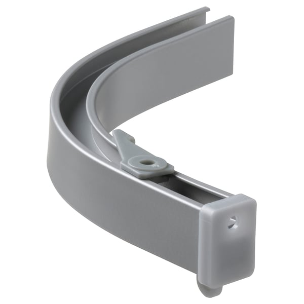 A grey VIDGA corner curtain rail. This aluminum rail bends 90 degrees, ideal for creating a light-blocking canopy.