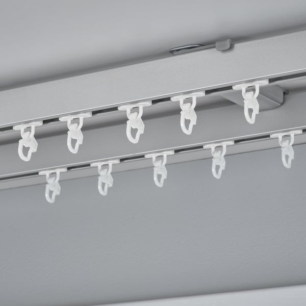 VIDGA clips on metal rail for smooth curtain layers.