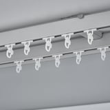 VIDGA clips on metal rail for smooth curtain layers.