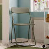 VIHALS grey folding chair, sleek & compact, fits perfectly in modern room.