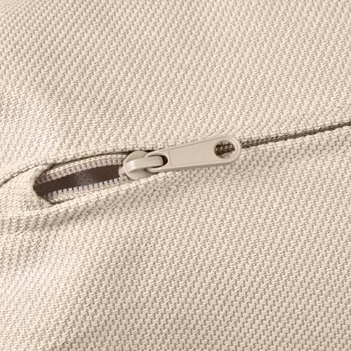 Close-up of sofa zip, smooth fabric, quality zip pull.