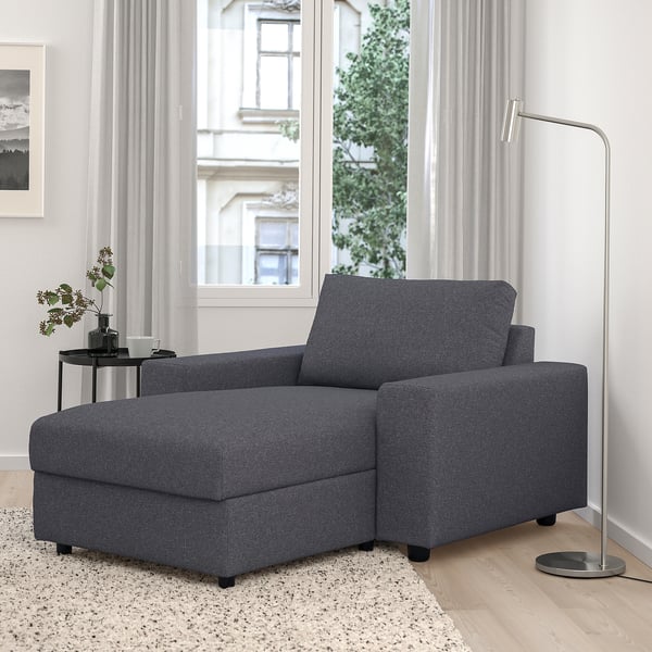 VIMLE sectional sofa with storage in dark grey room.