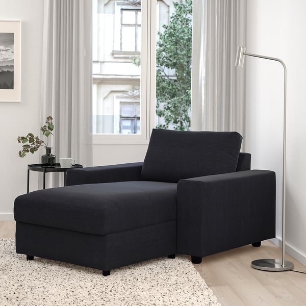 Modern VIMLE chaise sofa with storage in bright living room.