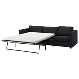 Dark grey convertible sofa, sleek & modern design with clean lines, cushioned seat, & back, ideal for compact spaces.