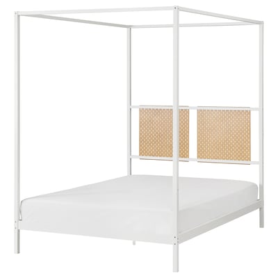 VITARNA white metal four-poster bed with cane panels and mattress.