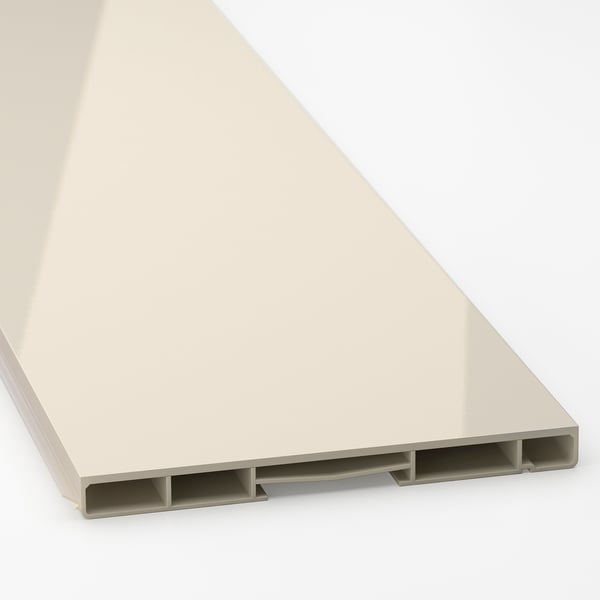 Beige high-gloss cabinet front with integrated handle, sleek and modern.