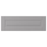 Een BODBYN-kast in zachtgrijs met afgeschuinde panelen, gemaakt van vezelplaat en polyurethaanverf.