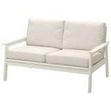Een bondholm 2-zitsbank voor buiten in wit, met lichte kussens, een stevig acacia frame en polyester kussens.